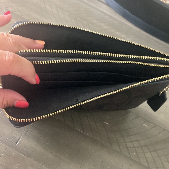 Coach wristlet in mint condition! This wristlet has 2 separate zipper pockets. - Picture 3 of 3